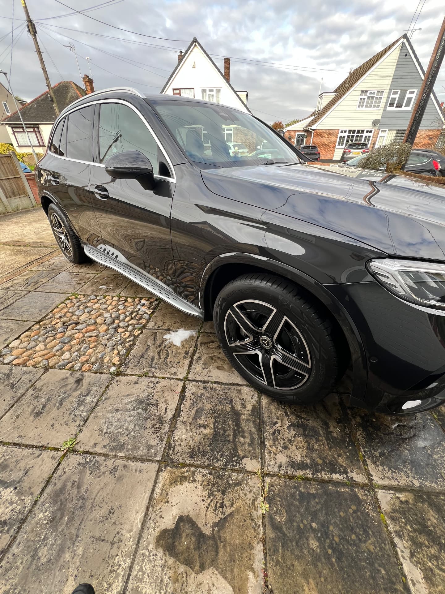 Black Mercedes GLC with a deep wet-look shine after detailing