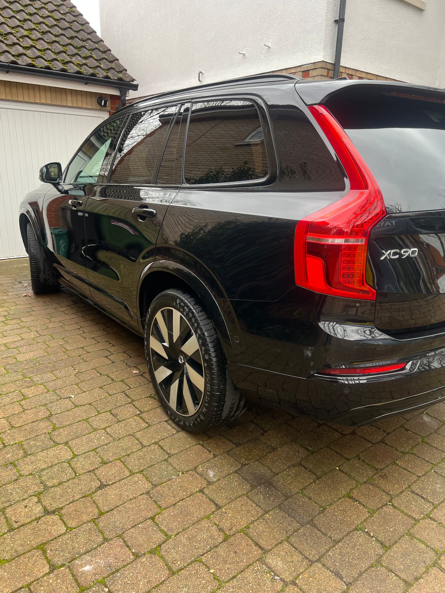 Black Volvo XC90 with a deep wet-look shine after a full valet